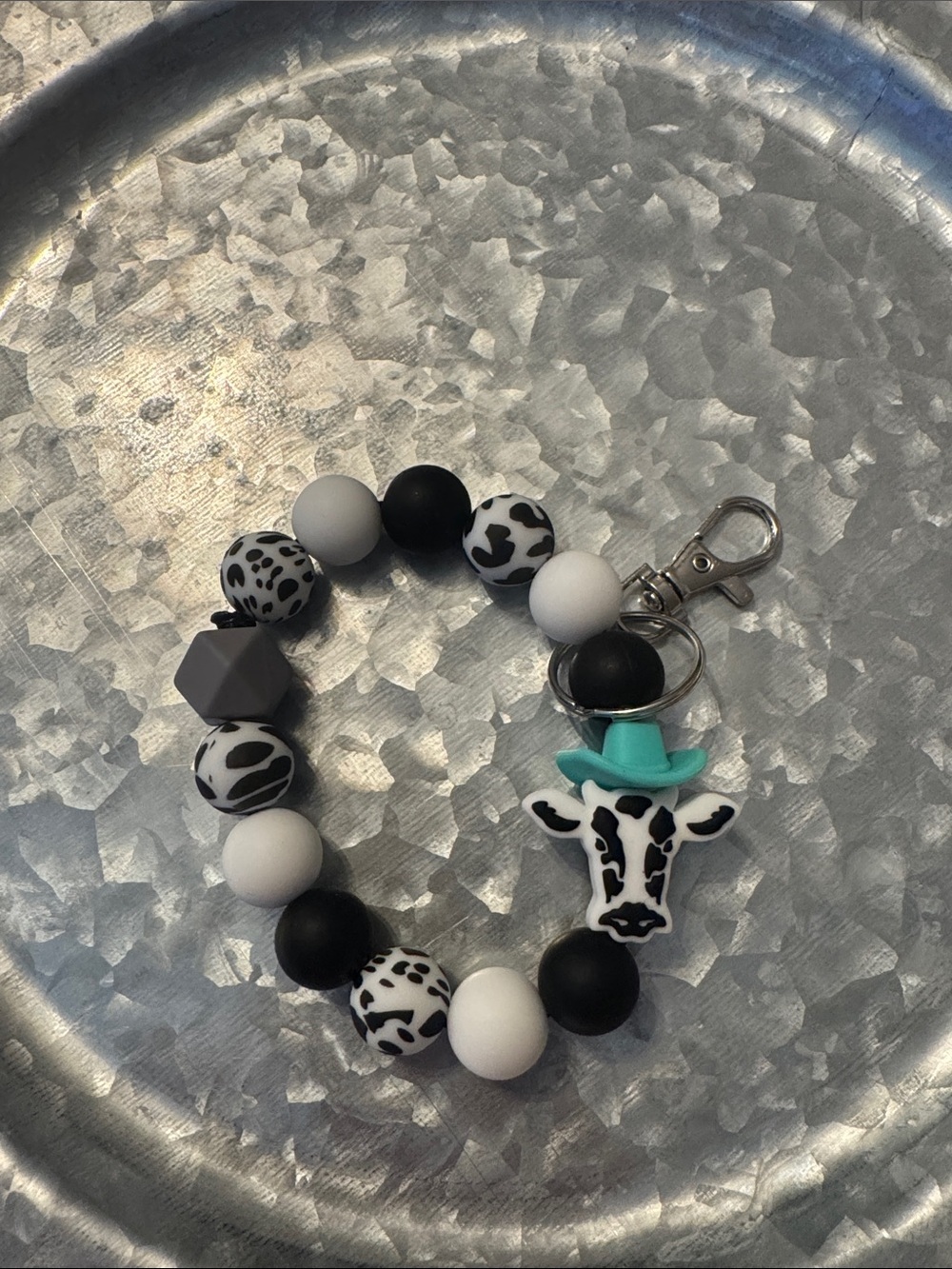 Cow Print Black & White Beaded Keychain with Teal Hat Charm